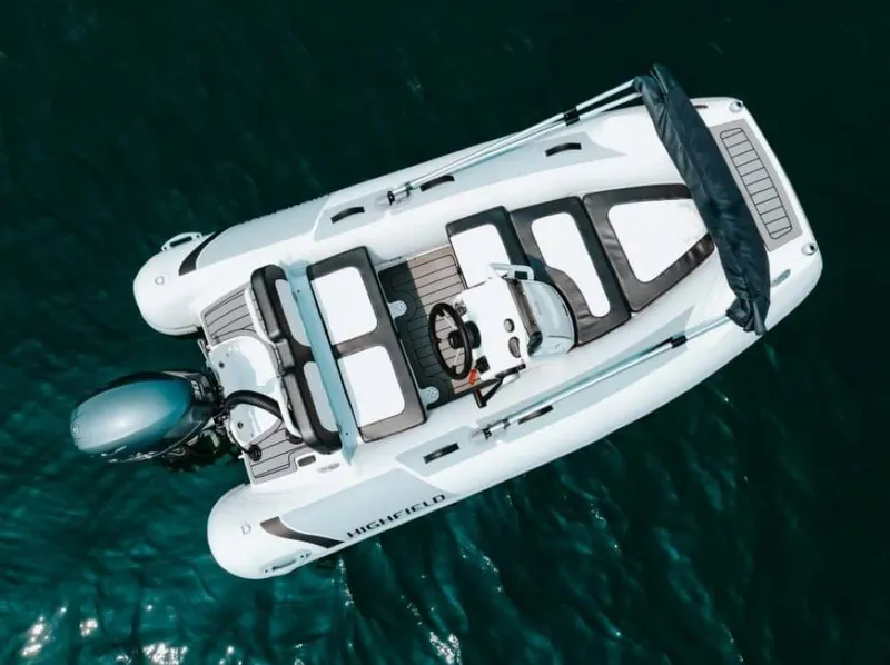 Slide: The Image of 2024 Highfield Sport 330 boat on water, aerial view. - 4