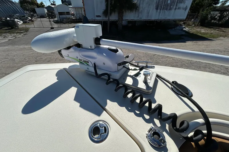 Slide: The Image of 2016 Scout 275 LXF boat with mounted trolling motor on deck. - 24