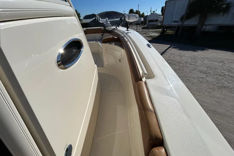Slide: The Image of 2016 Scout 275 LXF boat interior with sleek design and comfortable seating. - 30
