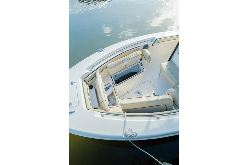 Slide: The Image of 2022 Sea Chaser 24 HFC boat interior with seating and storage compartments. - 8