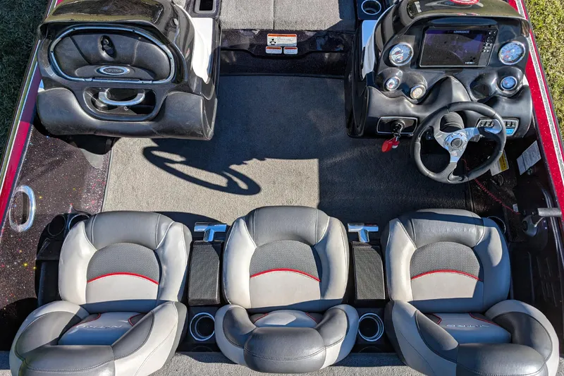 Slide: The Image of Interior of a 2015 Nitro Z-9 boat with steering console and seating arrangement. - 11