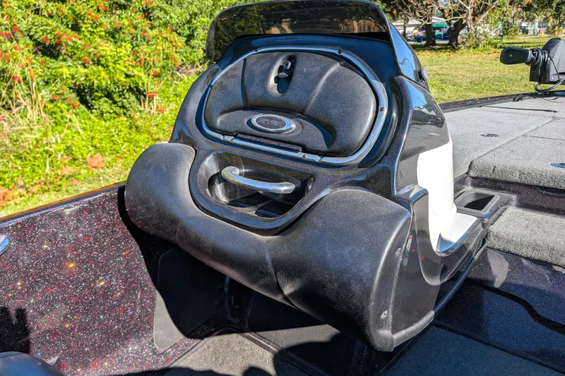 Slide: The Image of 2015 Nitro Z-9 boat console with sleek black design and storage compartment. - 16