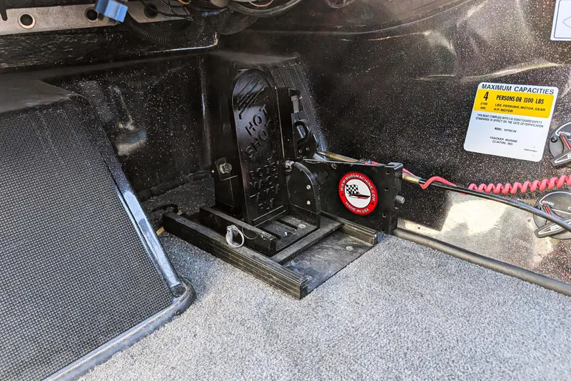 Slide: The Image of Interior of 2015 Nitro Z-9 boat showing foot pedal and safety label. - 19