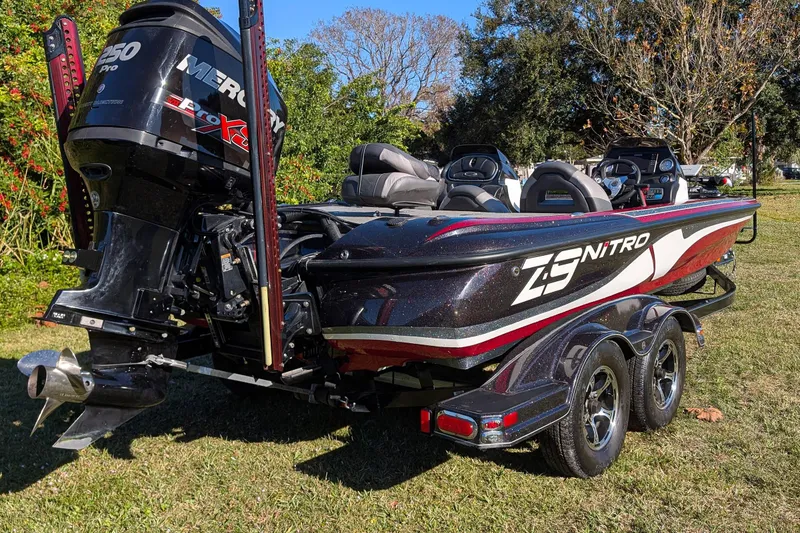 Slide: The Image of 2015 Nitro Z-9 boat with Mercury Pro XS engine on grass. - 6
