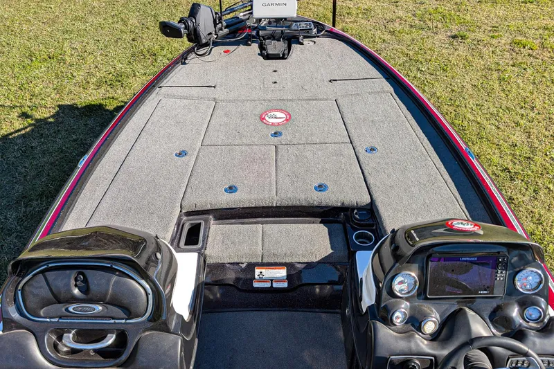 Slide: The Image of 2015 Nitro Z-9 boat interior with control panel and carpeted deck. - 8