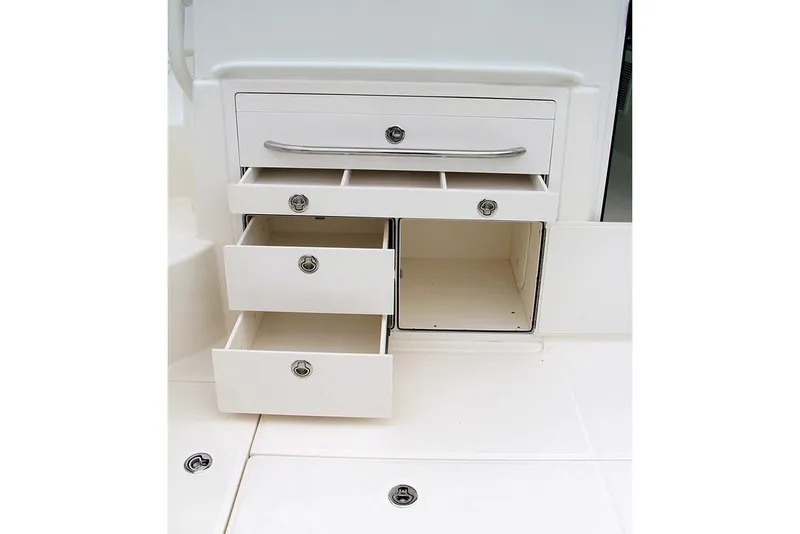 Slide: The Image of Manufacturer Provided Image: Storage drawers on a 2021 Boston Whaler 345 Conquest boat. - 11