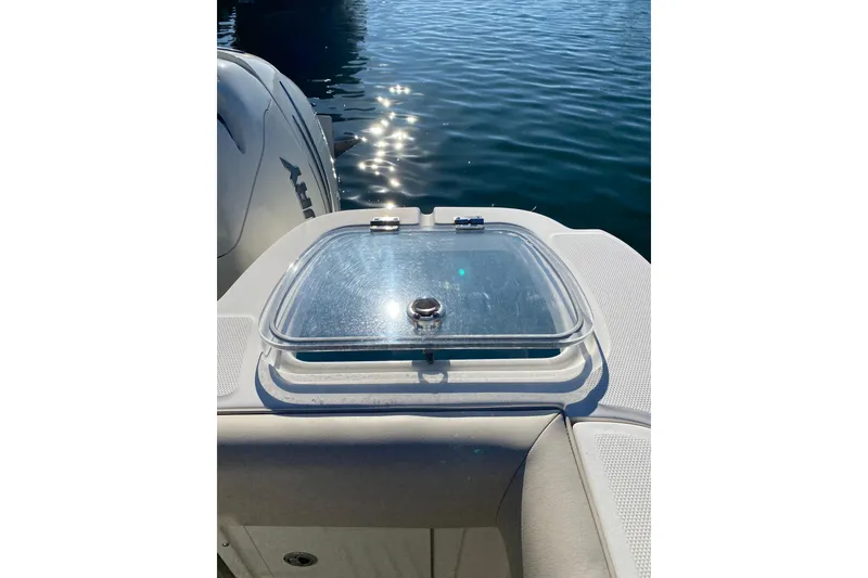 Slide: The Image of 2021 Boston Whaler 345 Conquest boat detail with water reflection. - 13