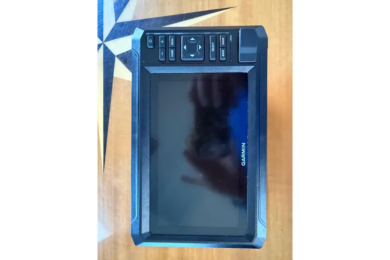 Slide: The Image of Garmin marine GPS device on a 2003 Sea Pro SV2100CC Bay Boat. - 27