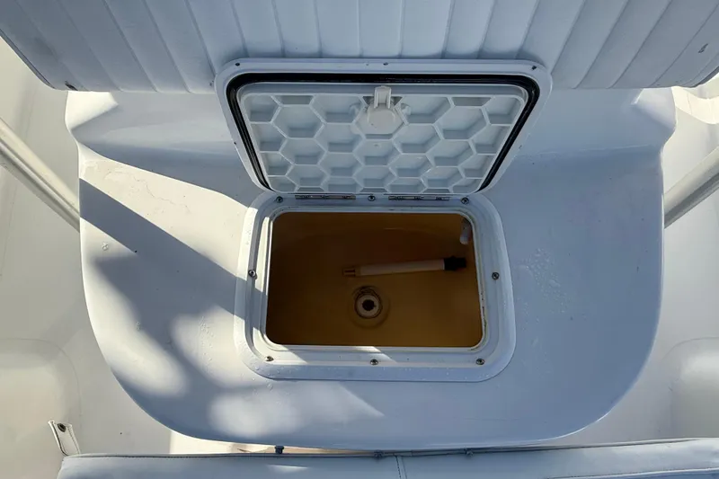 Slide: The Image of Open storage compartment on 2003 Sea Pro SV2100CC Bay Boat. - 38