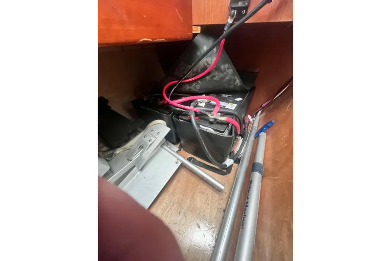 Slide: The Image of EPIRB device on Beneteau 393 yacht, 2007 model, mounted on wooden surface. - 16