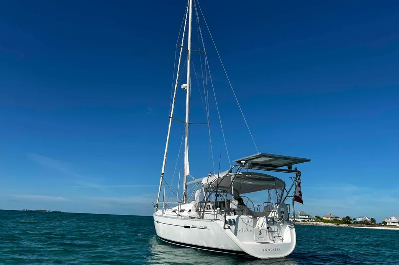 Slide: The Image of Interior of 2007 Beneteau 393 yacht with cozy seating and modern amenities. - 25