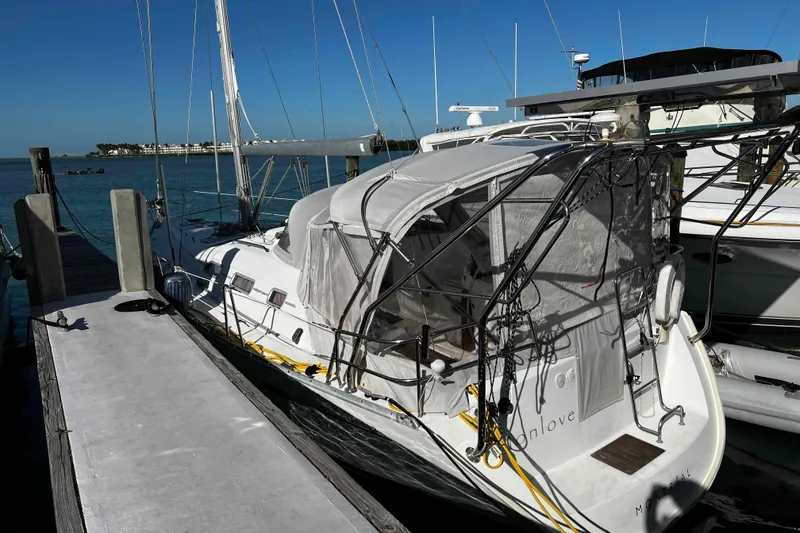 Slide: The Image of Floor plan of a 2007 Beneteau 393 sailboat, featuring cabins and amenities. - 28