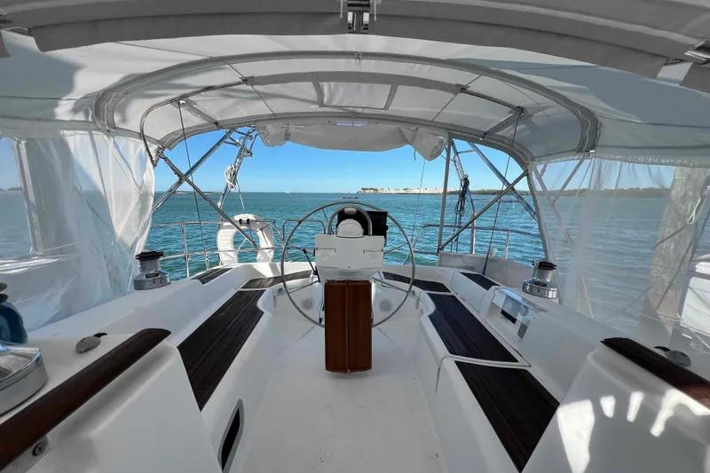 Slide: The Image of Cockpit view of 2007 Beneteau 393 sailboat with ocean backdrop. - 3
