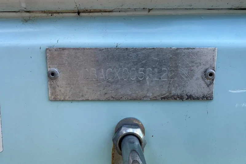 Slide: The Image of Hull identification number on 2022 Cobia 220 Center Console boat. - 14