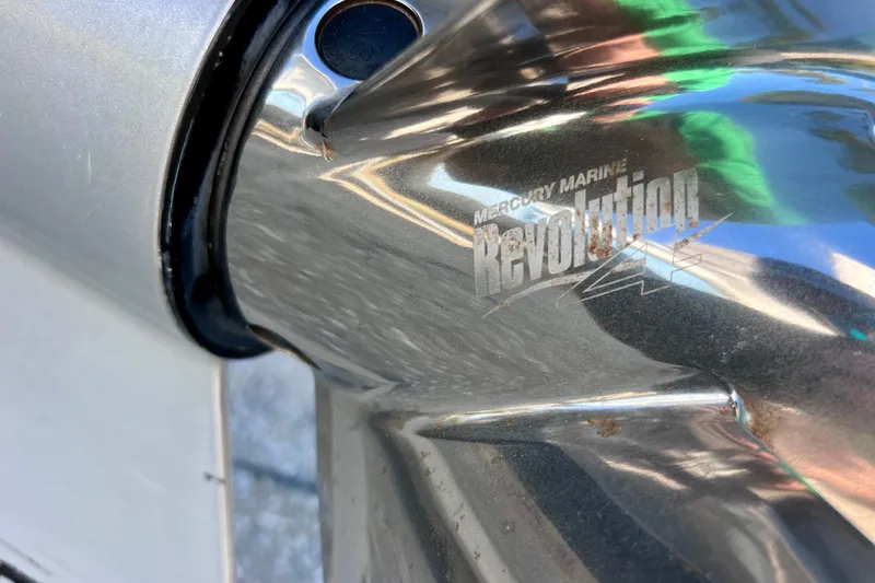 Slide: The Image of Close-up of Mercury Marine Revolution 4 propeller on 2024 Sea Ray SLX 280 Outboard. - 16