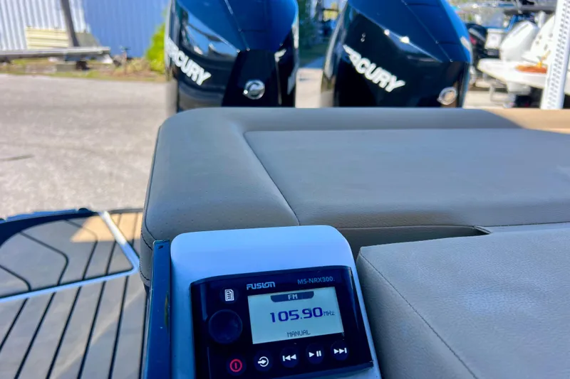 Slide: The Image of 2024 Sea Ray SLX 280 Outboard with Mercury engines and Fusion stereo display. - 25