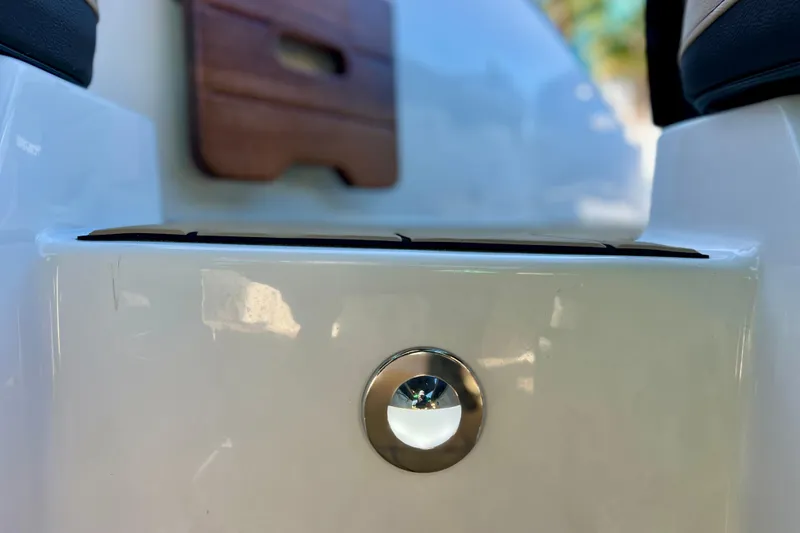 Slide: The Image of 2024 Sea Ray SLX 280 Outboard, close-up of sleek white exterior detail. - 27