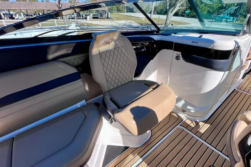 Slide: The Image of 2024 Sea Ray SLX 280 Outboard interior with luxurious seating and modern design. - 40