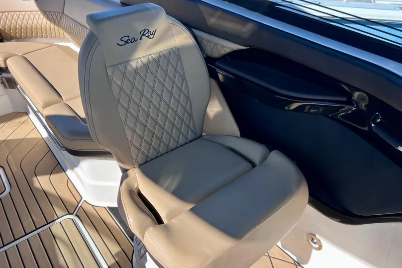 Slide: The Image of 2024 Sea Ray SLX 280 Outboard boat interior with luxurious seating and elegant design. - 42