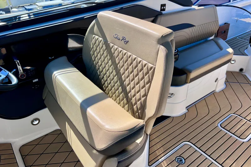 Slide: The Image of 2024 Sea Ray SLX 280 Outboard interior with luxurious seating and elegant design. - 45