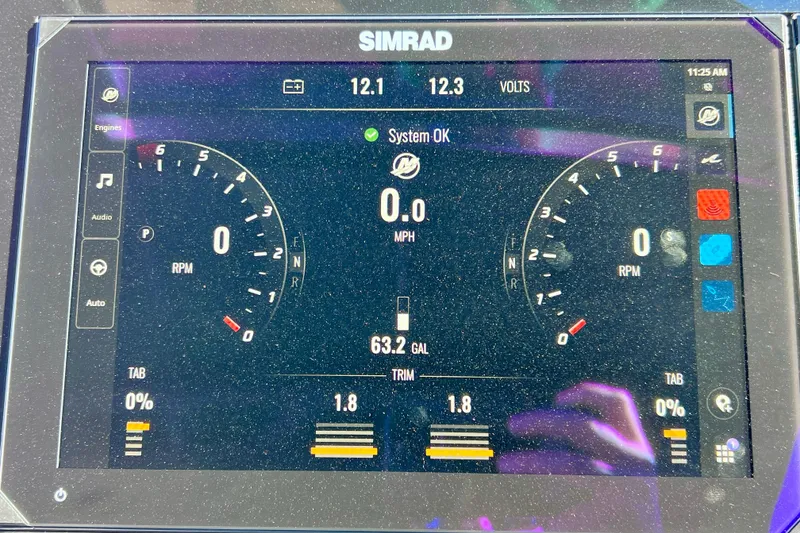 Slide: The Image of Simrad display on 2024 Sea Ray SLX 280 Outboard showing engine and system status. - 57