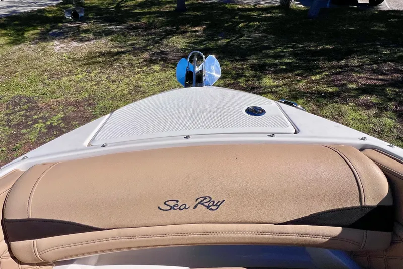Slide: The Image of 2024 Sea Ray SLX 280 Outboard boat with tan seating and sleek design. - 68