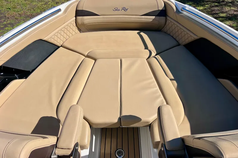 Slide: The Image of 2024 Sea Ray SLX 280 Outboard boat interior with tan leather seating. - 73
