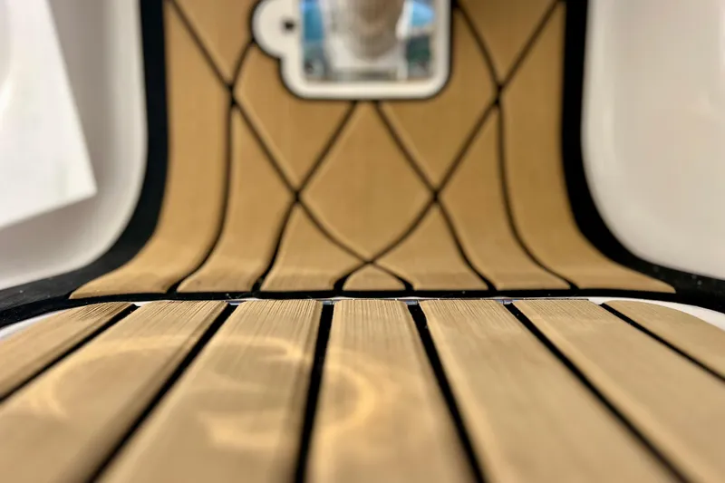 Slide: The Image of 2024 Sea Ray SLX 280 Outboard, teak-style flooring detail. - 75