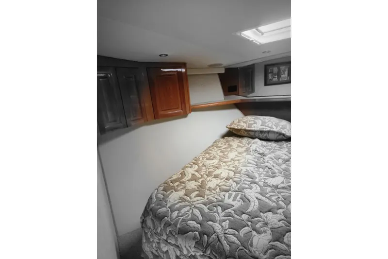 Slide: The Image of Luxurious interior of 1998 Sea Ray 550 Sedan Bridge yacht with elegant seating and decor. - 15