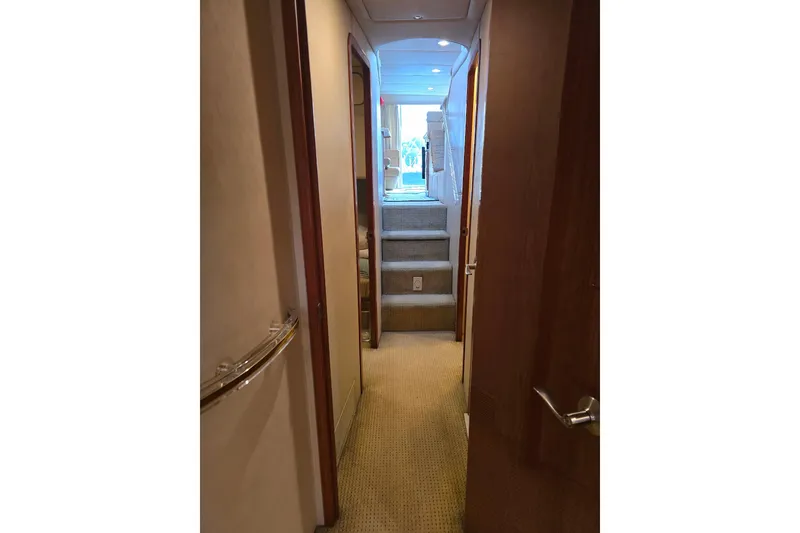 Slide: The Image of Bathroom interior of 1998 Sea Ray 550 Sedan Bridge yacht, featuring shower and sink. - 41