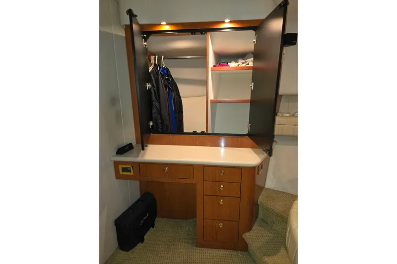 Slide: The Image of Bathroom interior of 1998 Sea Ray 550 Sedan Bridge yacht, featuring sink and shower. - 42