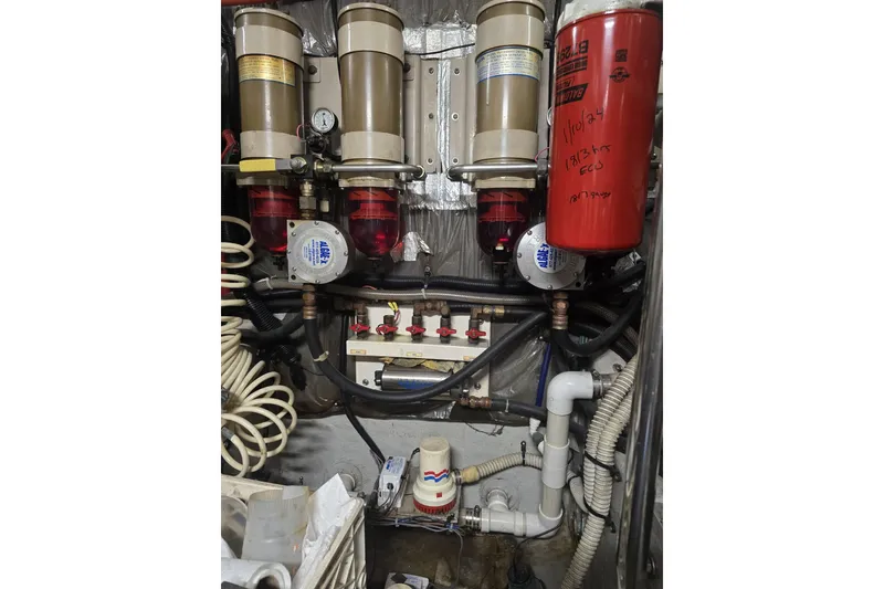 Slide: The Image of Interior hallway of 1998 Sea Ray 550 Sedan Bridge yacht, featuring carpeted stairs. - 44