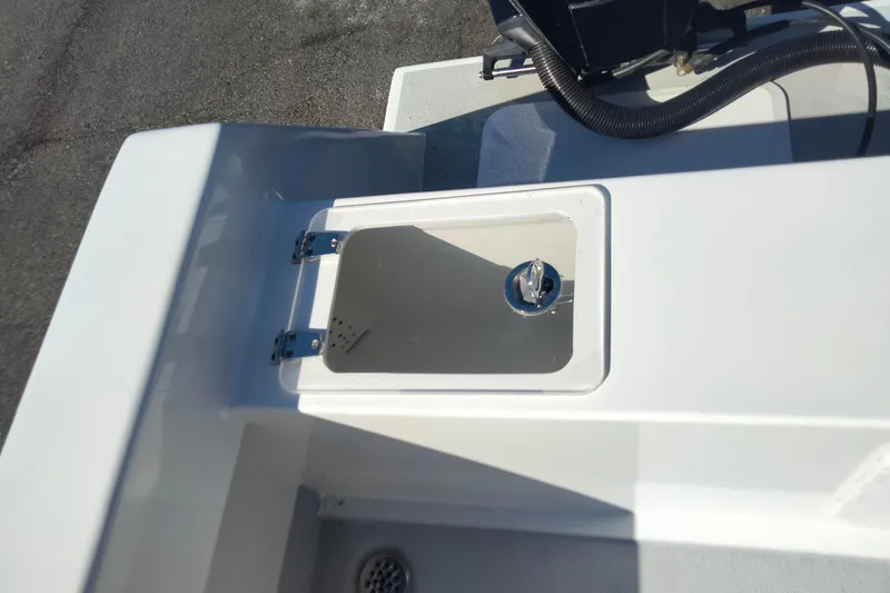 Slide: The Image of Custom 2021 Pilot House Catamaran deck with storage compartment and drain. - 11