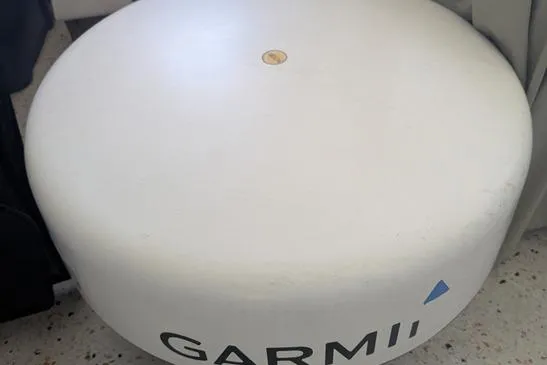 Slide: The Image of White Garmin radar dome on Glacier Bay 260 Canyon Runner, 2000 model. - 12
