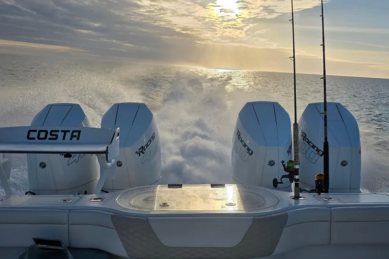 Slide: The Image of 2024 Costa Custom Boats 34 SV interior with luxurious seating and modern design. - 14