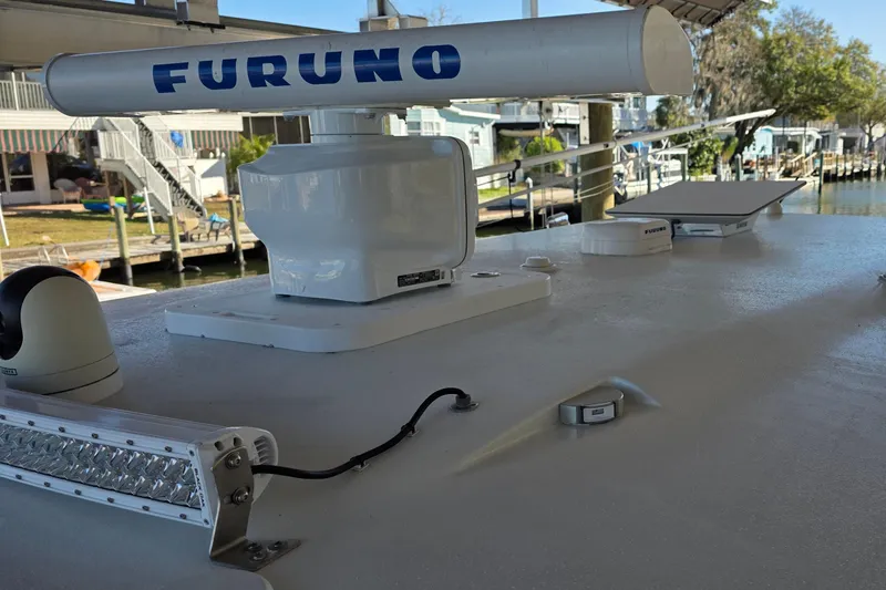 Slide: The Image of 2024 Costa Custom Boats 34 SV with Furuno radar and marine equipment on deck. - 30