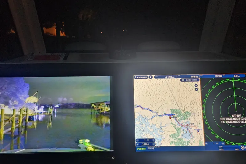 Slide: The Image of 2024 Costa Custom Boats 34 SV navigation display with radar and night vision. - 32