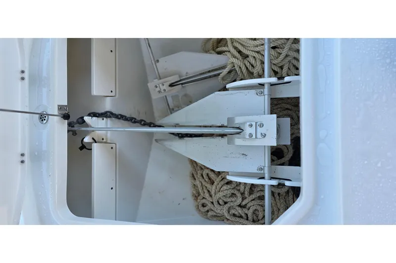 Slide: The Image of Anchor compartment of 2024 Costa Custom Boats 34 SV with ropes and chains. - 60