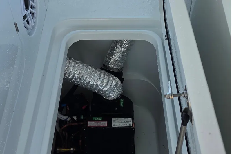 Slide: The Image of 2024 Costa Custom Boats 34 SV engine compartment with ventilation ducts. - 62