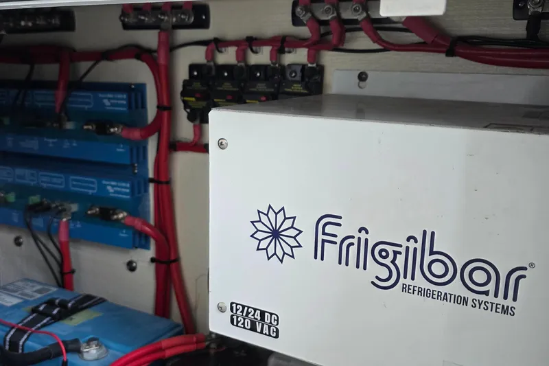 Slide: The Image of Electrical system of 2024 Costa Custom Boats 34 SV with Frigibar refrigeration unit. - 64