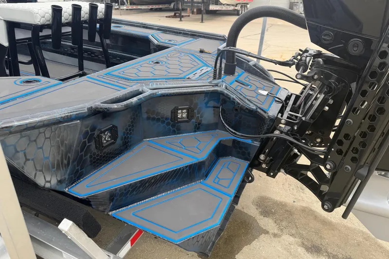 Slide: The Image of 2025 Timber Creek 2064 boat with hexagonal pattern and advanced motor system. - 15