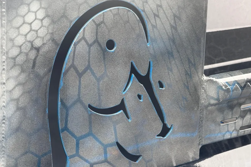 Slide: The Image of Metal panel with abstract design, featuring hexagonal pattern and cut-out shapes, Timber Creek 2064 model. - 28