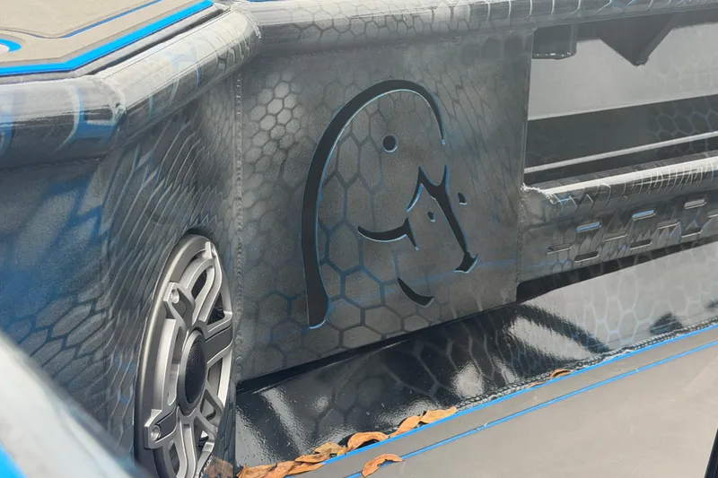 Slide: The Image of Interior of 2025 Timber Creek 2064 boat with speaker and hexagonal pattern design. - 29