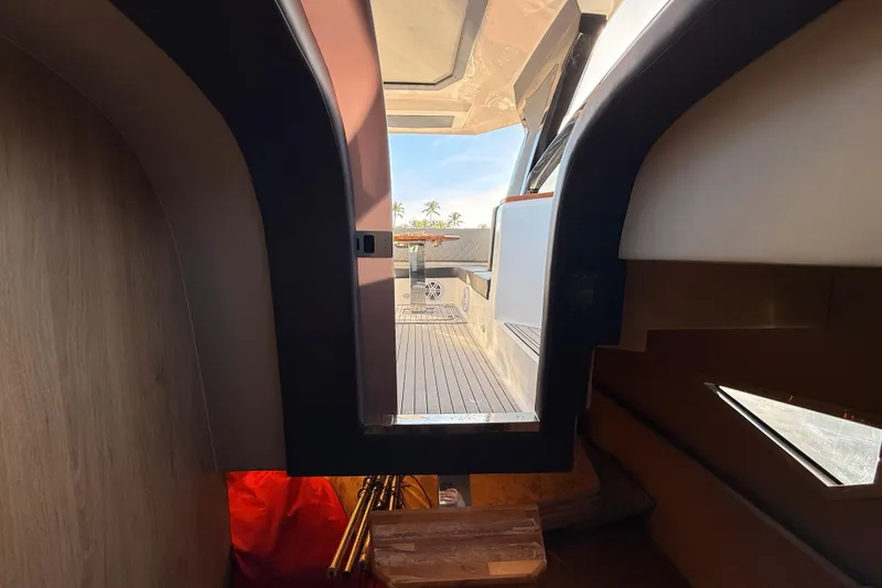 Slide: The Image of Interior view of 2023 NX Boats 360 Sport Coupe, showcasing sleek design and modern features. - 21