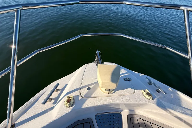 Slide: The Image of Bow view of 2023 NX Boats 360 Sport Coupe on calm water. - 62
