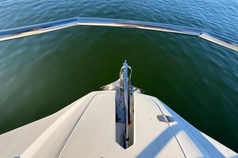 Slide: The Image of Bow view of 2023 NX Boats 360 Sport Coupe on calm water. - 63