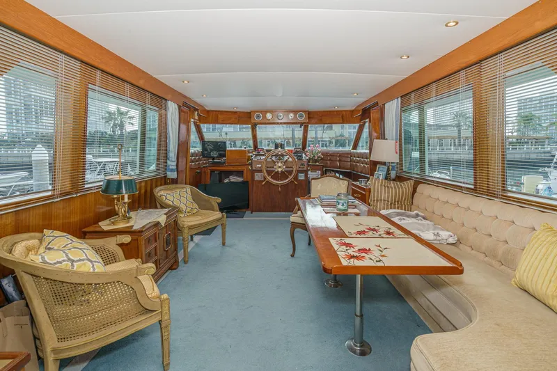 Slide: The Image of Luxurious interior of a 1971 Hatteras 53 Motor Yacht with elegant seating and decor. - 20