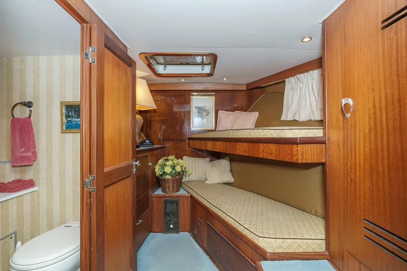 Slide: The Image of 1971 Hatteras 53 Motor Yacht cabin with bunk beds and bathroom. - 40