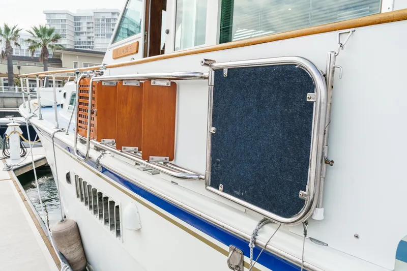 Slide: The Image of 1971 Hatteras 53 Motor Yacht side view with wooden and metal details. - 5