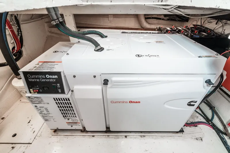 Slide: The Image of Cummins Onan marine generator in 1971 Hatteras 53 Motor Yacht engine room. - 69